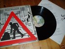 MEN OPENING UMBRELLAS AHEAD - Vivian Stanshall. K56052