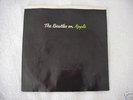 BEATLES ON APPLE SLEEVE  RARE NO HOLE IN  NM CONDITION