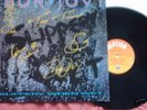 Bon Jovi signed lp rare with COA. Slippery When Wet.