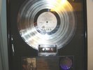 A 1987 REM PLATINUM RECORD SALES AWARD