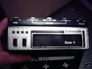 RADIOMOBILE QUADRAPHONIC 8-TRACK CAR PLAYER & TAPES
