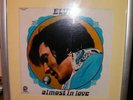 Elvis Presley Almost in Love LP with signature (framed)
