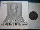 The Vogue (Ronnie Urini) a doll spits cubes, limited Lp