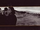 33 T  U2     THE JOSHUA TREE   ( DISQUE  jaune marbré )