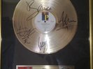 U2 SIGNED RIAA AWARD UNDER A BLOOD RED SKY AUTOGRAPH