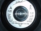 U2 TWO HEARTS BEAT AS ONE 7