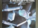 LIBRARY MONDIOPHONE PIERRE PORTE A MUSICAL PICTURE ?