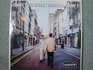 OASIS - WHATS THE STORY 12