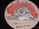 =MICHAEL PROPHET THE COP A COME=