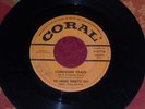 Johnny Burnette Trio.  Coral 61758,  Lonesome Train/I Just Found You.  45 rpm