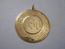 14k medallion from USO to Jane Froman