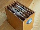78 rpm singles, Elvis Presley, Pat Boone, Cliff Richard etc. 16 in wooden case.