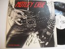 Autographed by entire band Motley Crue 