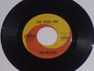 BEATLES.  the.  . SHE LOVES YOU.  ORIGINAL CANADIAN PRESS. STRONG VG+.  45