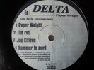 Delta - Paperweight 12