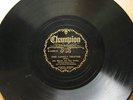 Asa Martin and Ray Hobbs on black Champion 16520 in 