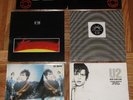 U2 Pac II,4x45 Ireland import plastic sleeve New Year's Day/Fire/Celebration/Glo