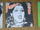 X-ray spex  Singles inc The day the world turned DAYGLO in orange vinyl