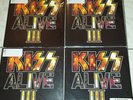 KISS - SET OF ALL 4 DIFFERENT COLOURS OF KISS ALIVE 3 (BLACK, RED, BLUE, WHITE)