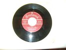 PEANUTS WILSON CAST IRON ARM  U.S.A. ISSUE