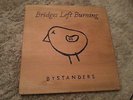 Bridges left burning bystanders Test pressings benefit auction assault records