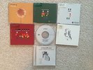 Six Coldplay singles (Talk, Yellow, Fix You, Speed of Sound, Clocks, Bros+Sis)
