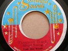 LLOYD YOUNG-FREETOWN SKANK/HIPPY SHUFFLE-RON WILSON ORIG JA 45 LISTEN