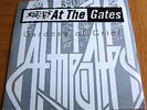 AT THE GATES-GARDENS OF GRIEF. UK 1994 PEACEVILLE CC7 CLEAR YELLOW VINYL.EX.EX.