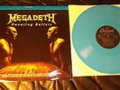 LP: MEGADETH - Sweating Bullets RAR Blaues Vinyl läuft von innen nach außen NM