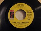 John Gary Williams The Whole Damn World is going Crazy promo 45 on Stax mp3