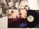 THE EAGLES - HOTEL CALIFORNIA - 1ST PRESS VINYL LP + POSTER 6E STERLING LH VG++