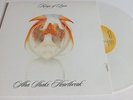 KINGS OF LEON AHA SHAKE HEARTBREAK LP LIMITED WHITE VINYL LISTEN