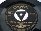 (GOLD LONDON) -- OUT OF THIS WORLD WITH FLYING SAUCERS --DAVE BARRY/ SARA BERNER