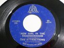 The Attractions 45 That Girl Is Mine / New Girl In The Neighborhood Vinyl Record