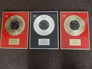 the beatles single  framed i feel fine 1964 help 1965 lady madonna 1968 first