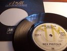SEX PISTOLS. GOD SAVE THE QUEEN. GENUINE A&M RECORDS.