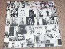 ROLLING STONES , EXILE ON MAIN ST . WITH POSTCARDS . LISTEN TO BOTH SIDES .