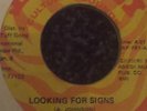 looking for signs/albert malawi