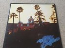 THE EAGLES Hotel California Vinyl LP 33RPM EX With Poster ORIGINAL UK CLASSIC