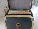 EP and 45RPM records for sale in carrying case and in original sleeves