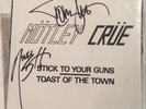 AUTOGRAPHED MÖTLEY CRÜE STICK TO YOUR GUNS LEATHÜR RECORDS 45 VINYL SINGLE