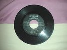 Derrick Harriott...Do I worry..on black Crystal label