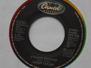 ROGER TAYLOR (QUEEN) Strange frontier NM- CANADA ORIG 1984  CAPITOL 45