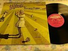 Genesis Nursery Cryme Orig' UK LP Pink Scroll  LP with two tour programmes Mint