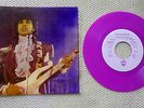 PRINCE AND THE REVOLUTION NM 45 PURPLE RAIN  PURPLE VINYL RECORD & SLEEVE 1984