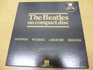 THE BEATLES ON COMPACT DISC. THE FIRST 4 BLACK HMV BOX SET STICKERED - BEATLES