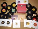 VINTAGE RED RECORD CARRYING CASE AND 23 VINTAGE 45s 7