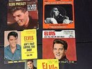 Seven Elvis Presley 45's RPM Original Pressings With Picture Sleeves