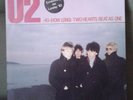 U2  40  (How Long) • Two Hearts Beat As One 7