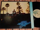 THE EAGLES   HOTEL CALIFORNIA LP   NEAR MINT ORIGINAL PRESS WITH POSTER